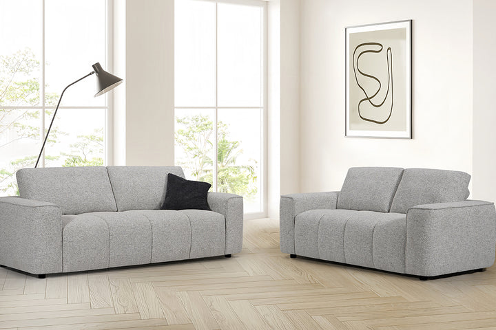 sviesiai pilka sofa lora 2s