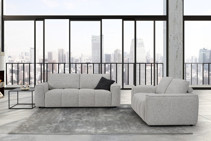 sviesiai pilka sofa lora 3s